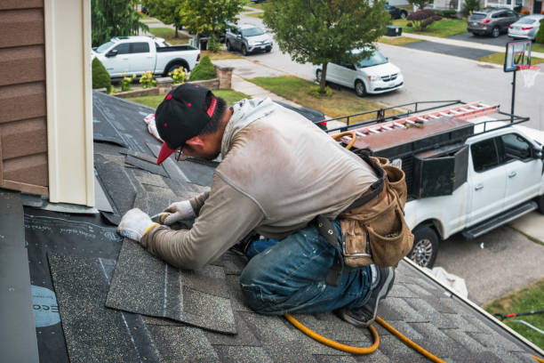 Professional Storm Damage Roof Repair technician working in Ramsey, NJ